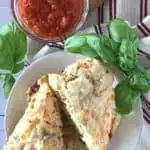 Pizza scones on plate with marinara sauce