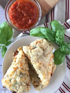 Pizza scones on plate with marinara sauce