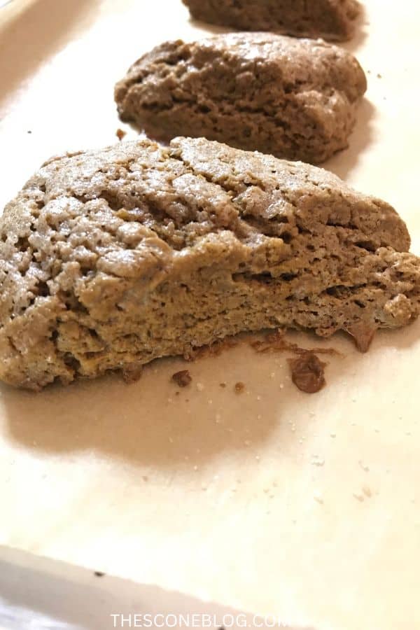 Baked gingerbread scones on baking sheet