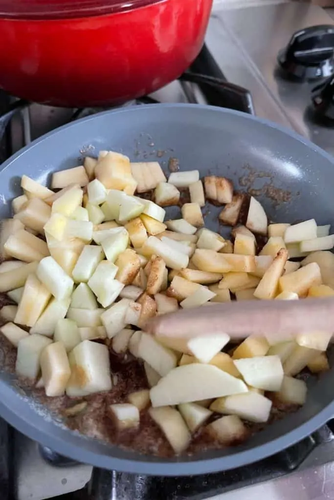 chopped apples cooking in butter