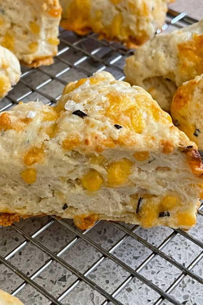 Rosemary cheese scone on wire rack