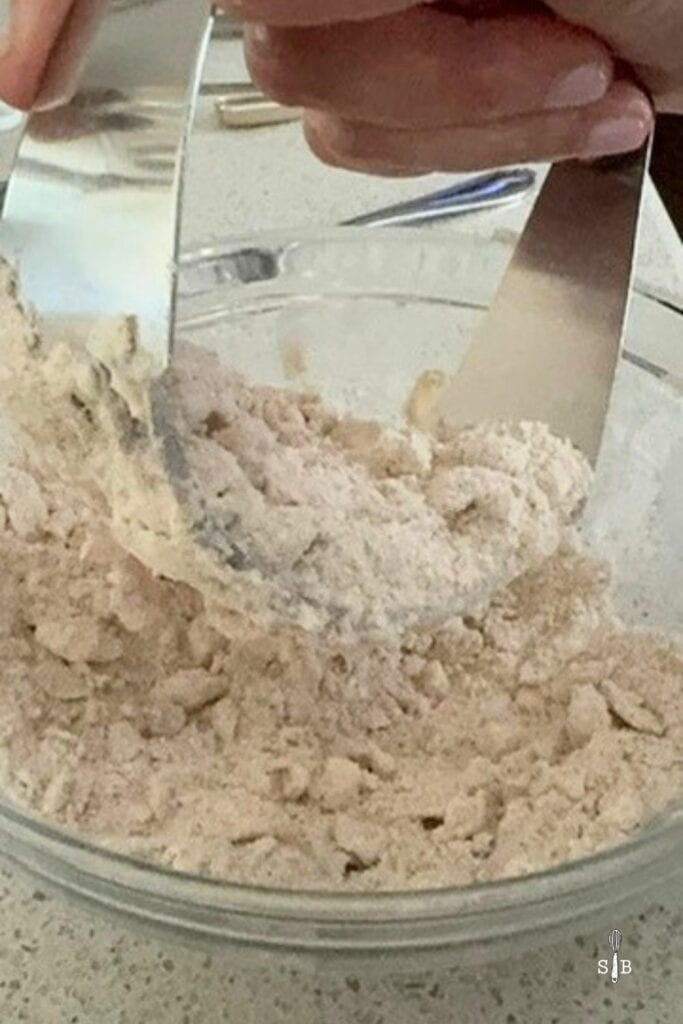 cutting butter with pastry cutter