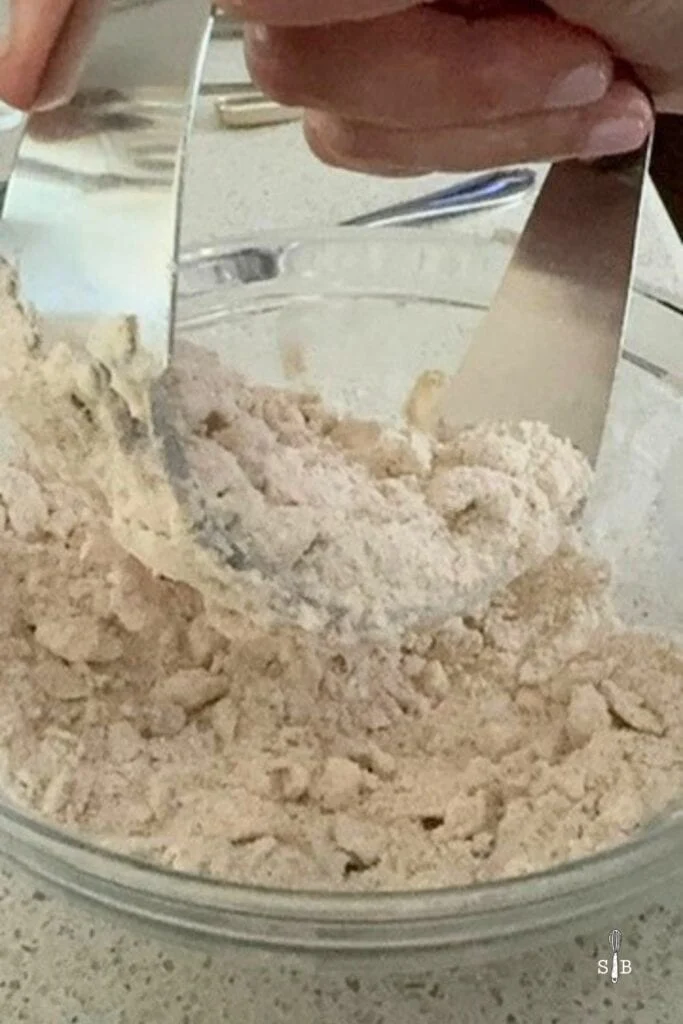 cutting butter with pastry cutter